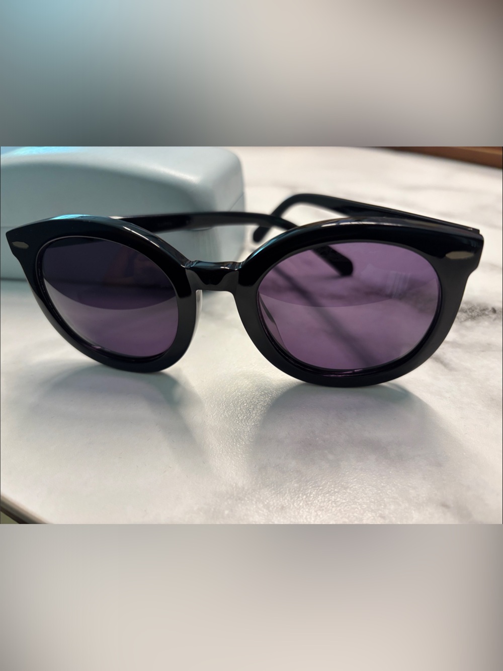 Karen Walker Black Frame Sunglasses with Purple Lenses